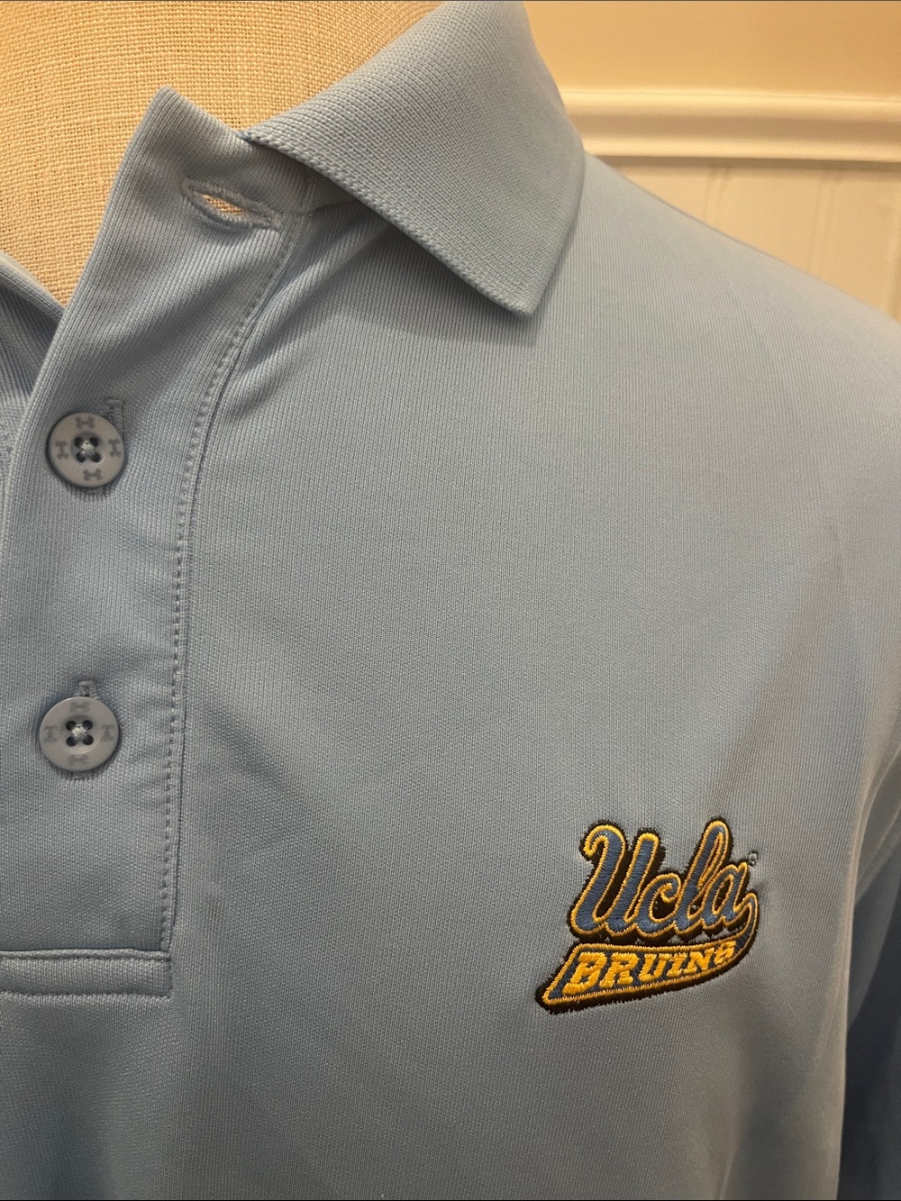 Under Armour UCLA Bruins Light Blue Polo Shirt. Size Large.